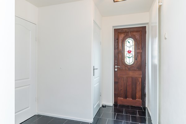 Foto - Te koop: Instapklare, monumentale woning met ruime woonkamer, tuinkamer en echte Amerikaanse veranda op een ruim perceel in Landgraaf.